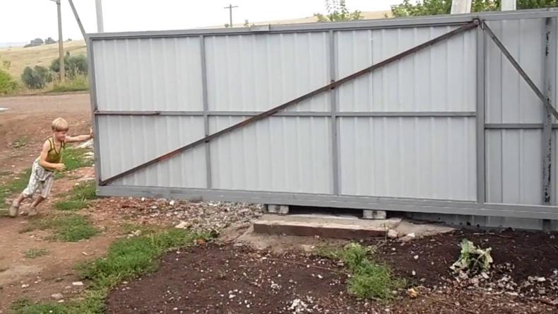 Откатные ворота своими руками: подробный план от замеров до запуска